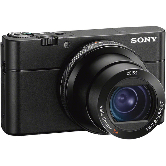 Black Sony camera with Zeiss lens on a white background